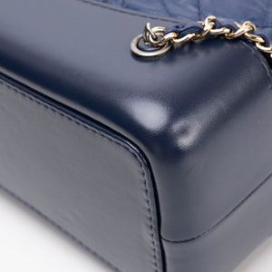 CHANEL SMALL GABRIELLE BACKPACK AGED CALFSKIN NAVY BLUE / BLACK RUTHENIUM HARDWARE