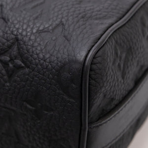 LOUIS VUITTON KEEPALL BANDOULIERE 25 MONOGRAM BLACK TAURILLON LEATHER BLACK HARDWARE (MICROCHIP)