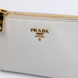 PRADA SAFFIANO LEATHER MINI POCHETTE BAG WHITE / BLACK GHW