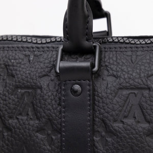 LOUIS VUITTON KEEPALL BANDOULIERE 25 MONOGRAM BLACK TAURILLON LEATHER BLACK HARDWARE (MICROCHIP)