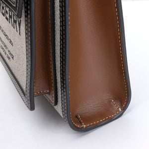 BURBERRY MINI POCKET BAG BLACK / TAN CALFSKIN GHW