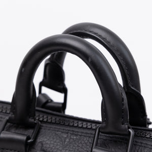 LOUIS VUITTON KEEPALL BANDOULIERE 25 MONOGRAM BLACK TAURILLON LEATHER BLACK HARDWARE