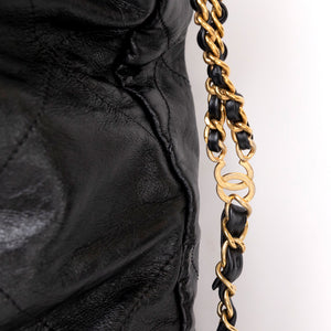 CHANEL LARGE 22 BACKPACK GOLD LETTER LOGO SHINY CALFSKIN BLACK GHW (MICROCHIP)