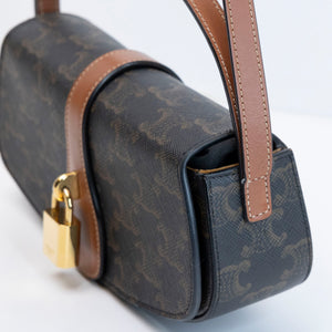 CELINE CLUTCH ON STRAP TABOU TRIOMPHE CANVAS / CALFSKIN TAN GHW