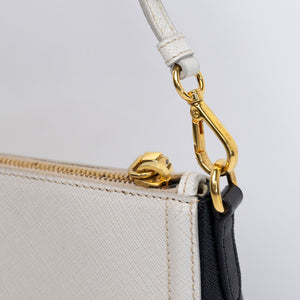 PRADA SAFFIANO LEATHER MINI POCHETTE BAG WHITE / BLACK GHW