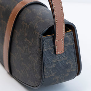 CELINE CLUTCH ON STRAP TABOU TRIOMPHE CANVAS / CALFSKIN TAN GHW