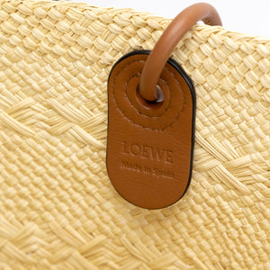 LOEWE MEDIUM ANAGRAM BASKET TOTE BAG IN IRACA PALM AND CALFSKIN NATURAL / TAN
