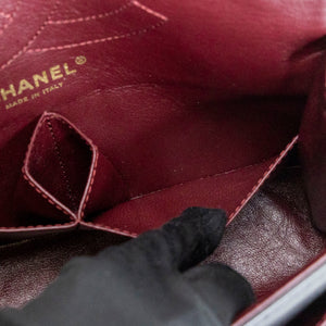 CHANEL SMALL 2.55 REISSUE DOUBLE FLAP BAG AGED CALFSKIN BLACK GHW