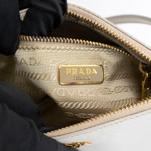 PRADA SAFFIANO LEATHER MINI POCHETTE BAG WHITE / BLACK GHW