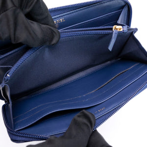 CHANEL SMALL BOY ZIP AROUND CONTINENTAL WALLET BLUE QUILTED CALFSKIN GHW