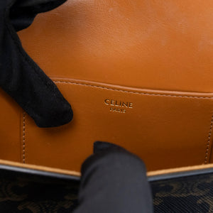 CELINE CLUTCH ON STRAP TABOU TRIOMPHE CANVAS / CALFSKIN TAN GHW