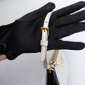 PRADA SAFFIANO LEATHER MINI POCHETTE BAG WHITE / BLACK GHW