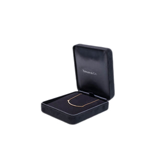 TIFFANY & CO. TIFFANY T SMILE PENDANT IN YELLOW GOLD