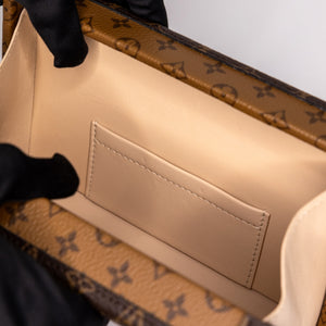 LOUIS VUITTON PETITE MALLE MONOGRAM REVERSE CANVAS