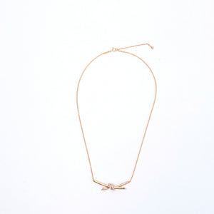 TIFFANY KNOT PENDANT IN YELLOW GOLD WITH DIAMONDS
