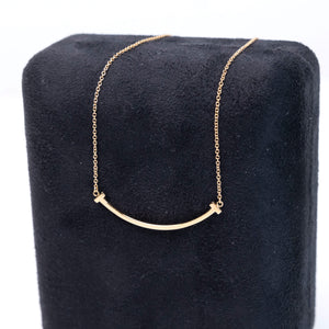 TIFFANY & CO. TIFFANY T SMILE PENDANT IN YELLOW GOLD