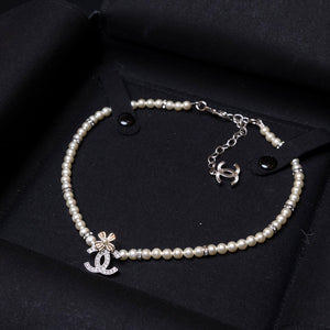 CHANEL 24K CC CLOVER PEARL NECKLACE
