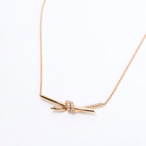 TIFFANY KNOT PENDANT IN YELLOW GOLD WITH DIAMONDS
