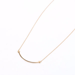 TIFFANY & CO. TIFFANY T SMILE PENDANT IN YELLOW GOLD