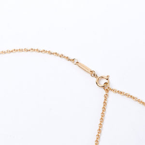 TIFFANY KNOT PENDANT IN YELLOW GOLD WITH DIAMONDS