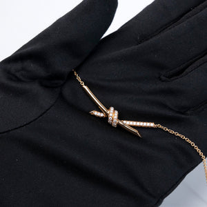 TIFFANY KNOT PENDANT IN YELLOW GOLD WITH DIAMONDS