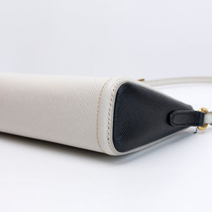 PRADA SAFFIANO LEATHER MINI POCHETTE BAG WHITE / BLACK GHW