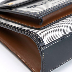 BURBERRY MINI POCKET BAG BLACK / TAN CALFSKIN GHW