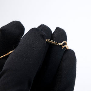 TIFFANY KNOT PENDANT IN YELLOW GOLD WITH DIAMONDS