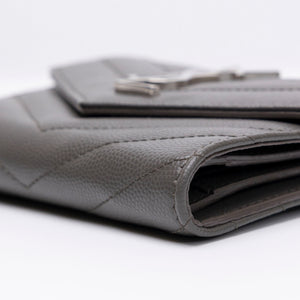 SAINT LAURENT CASSANDRE ENVELOPE COMPACT TRI-FOLD WALLET SHW
