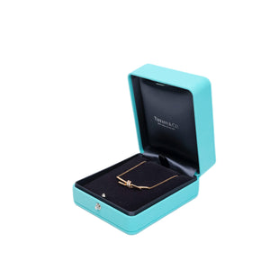 TIFFANY KNOT PENDANT IN YELLOW GOLD WITH DIAMONDS