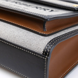 BURBERRY MINI POCKET BAG BLACK / TAN CALFSKIN GHW